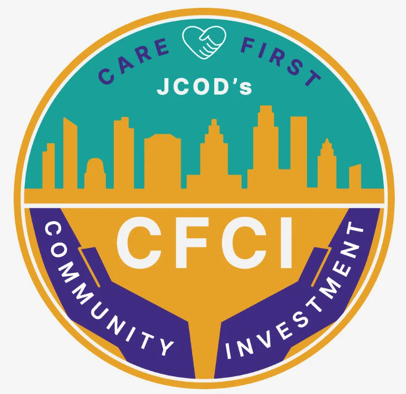 A circular logo with a city skyline, hands, and the text: 