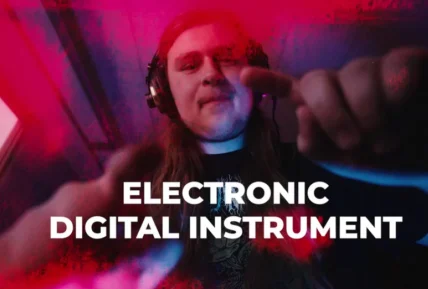 Person using an electronic digital instrument with headphones on, hands reaching towards the camera. Bold text in the center reads 